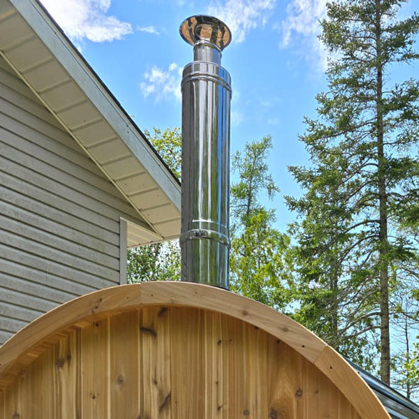 Top exit chimney installed through a barrel sauna roof