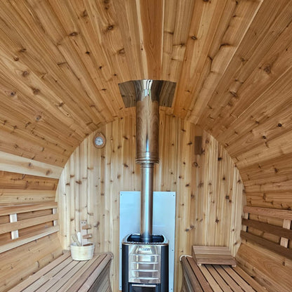 Interior view of a wood burning sauna heater with top exit chimney